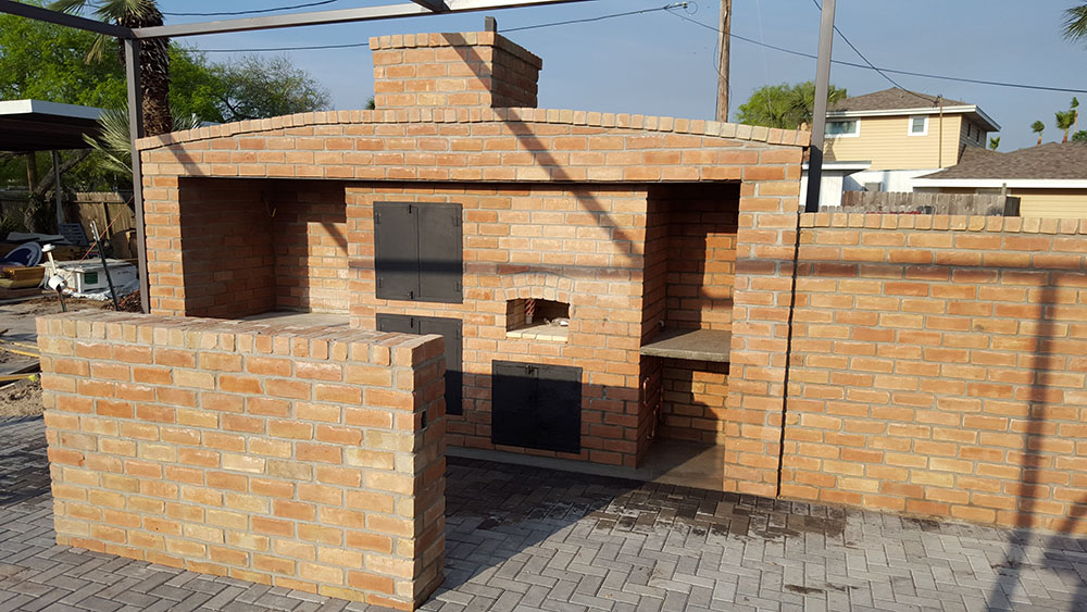 Large outdoor kitchens and oven.