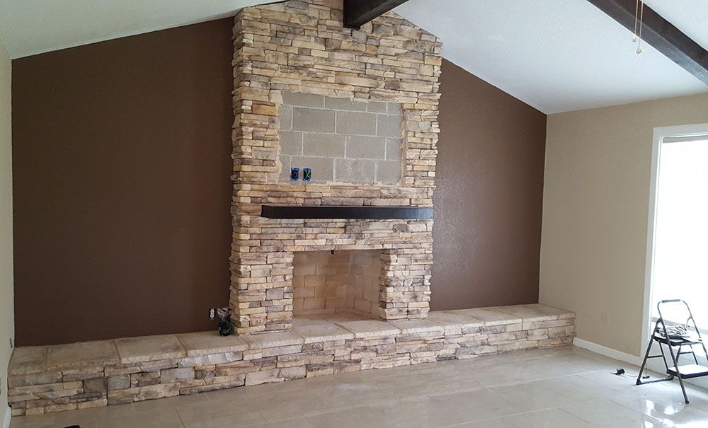Finished indoor fireplace. 