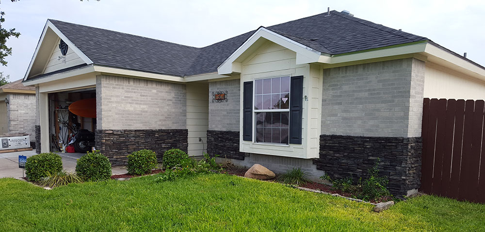 Stone walls on exterior of house. 