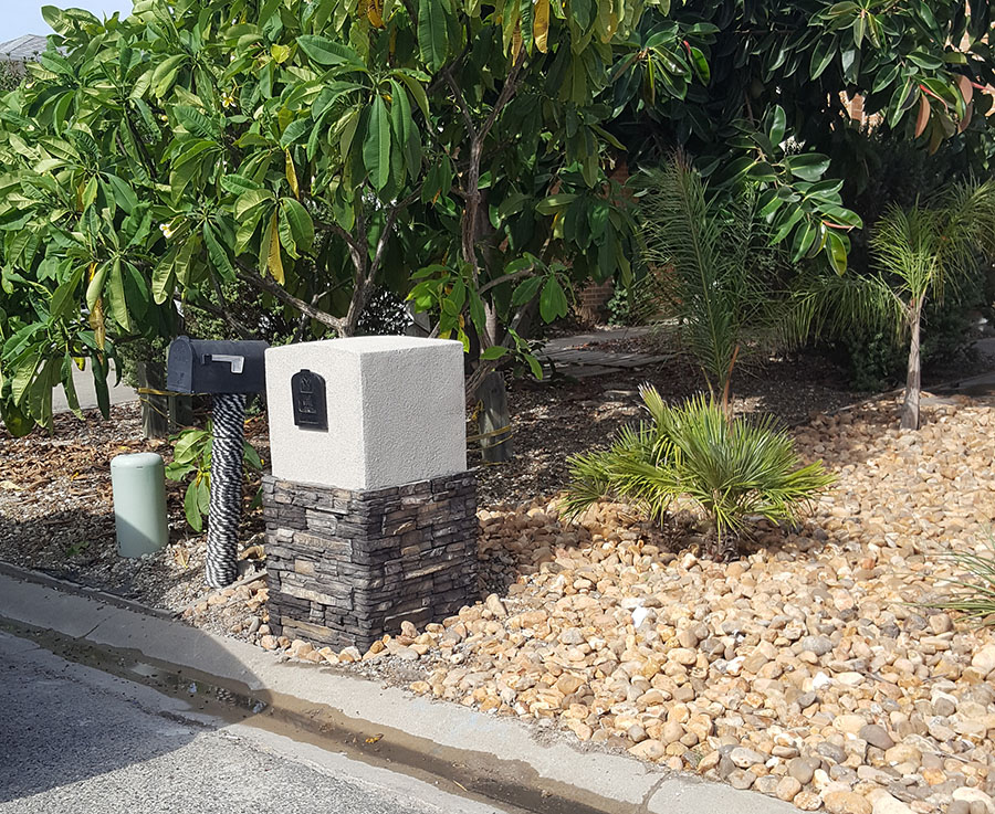 Stone mailbox. 