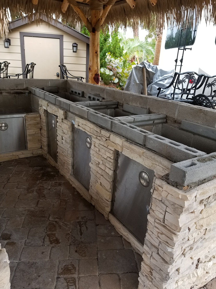 Outdoor kitchens include sinks, ovens and more.