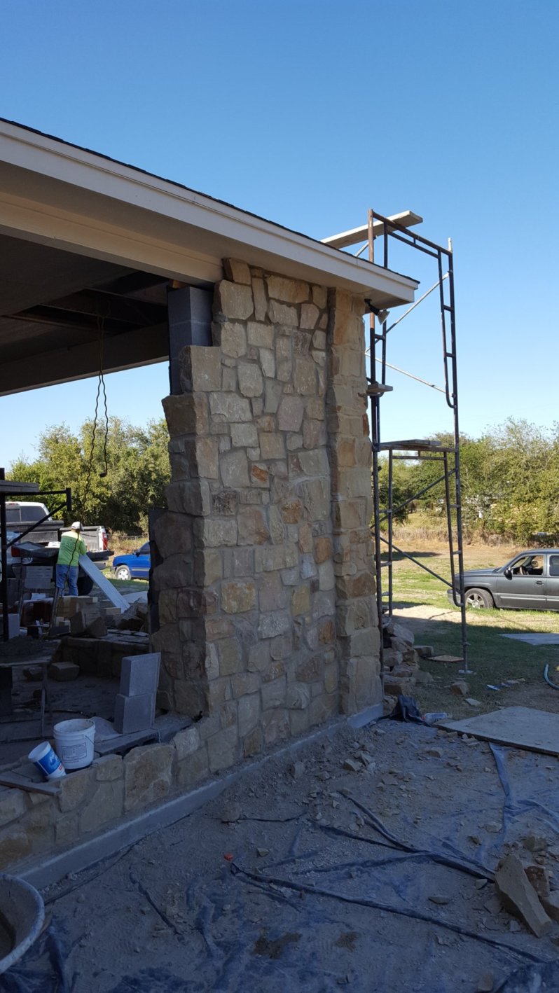 Outdoor fireplace and stonework by Coastal Masonry. 