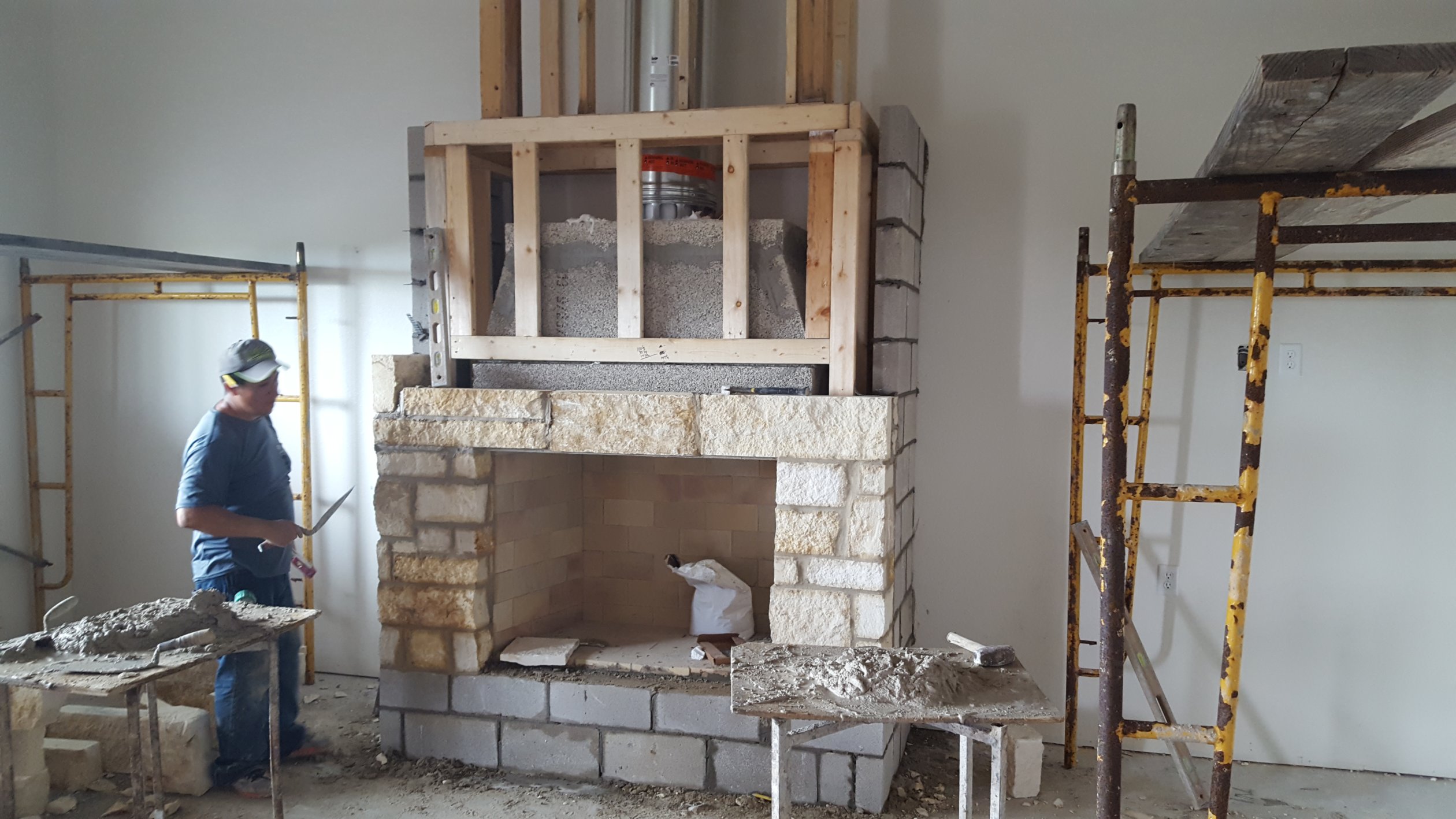 Indoor fireplace project by Coastal Masonry. 